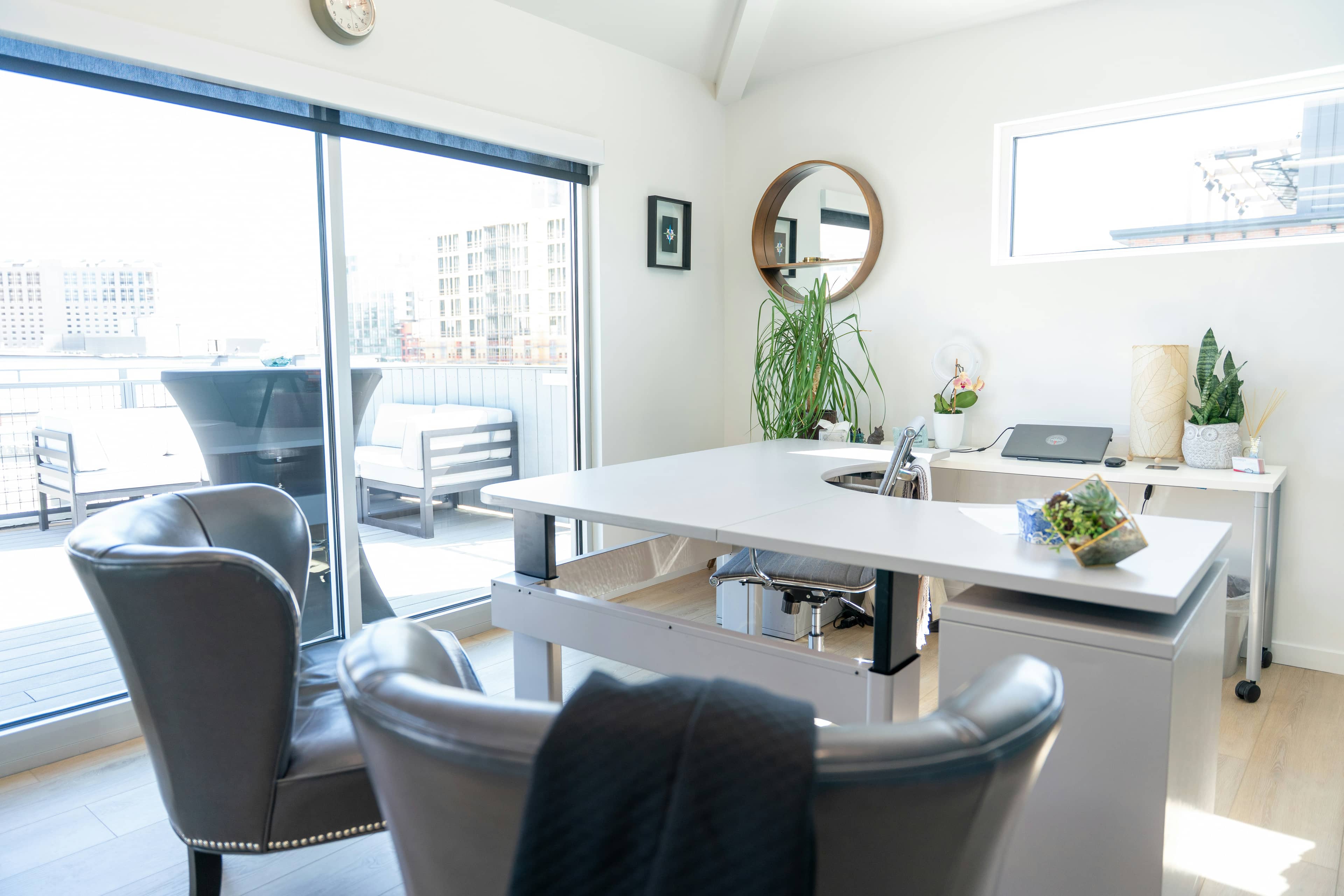 A bright, modern office with a meeting table